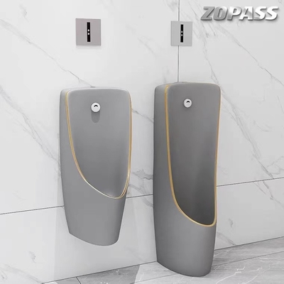 Uma bacia fixada na parede Grey Gold Color do mictório da batata traseira da parte